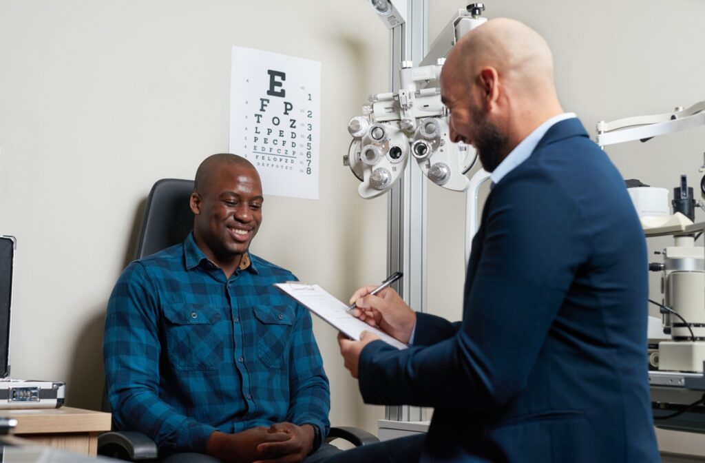 Patient consulting with an optometrist about laser eye surgery options.